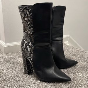 Black snakeskin boots.
